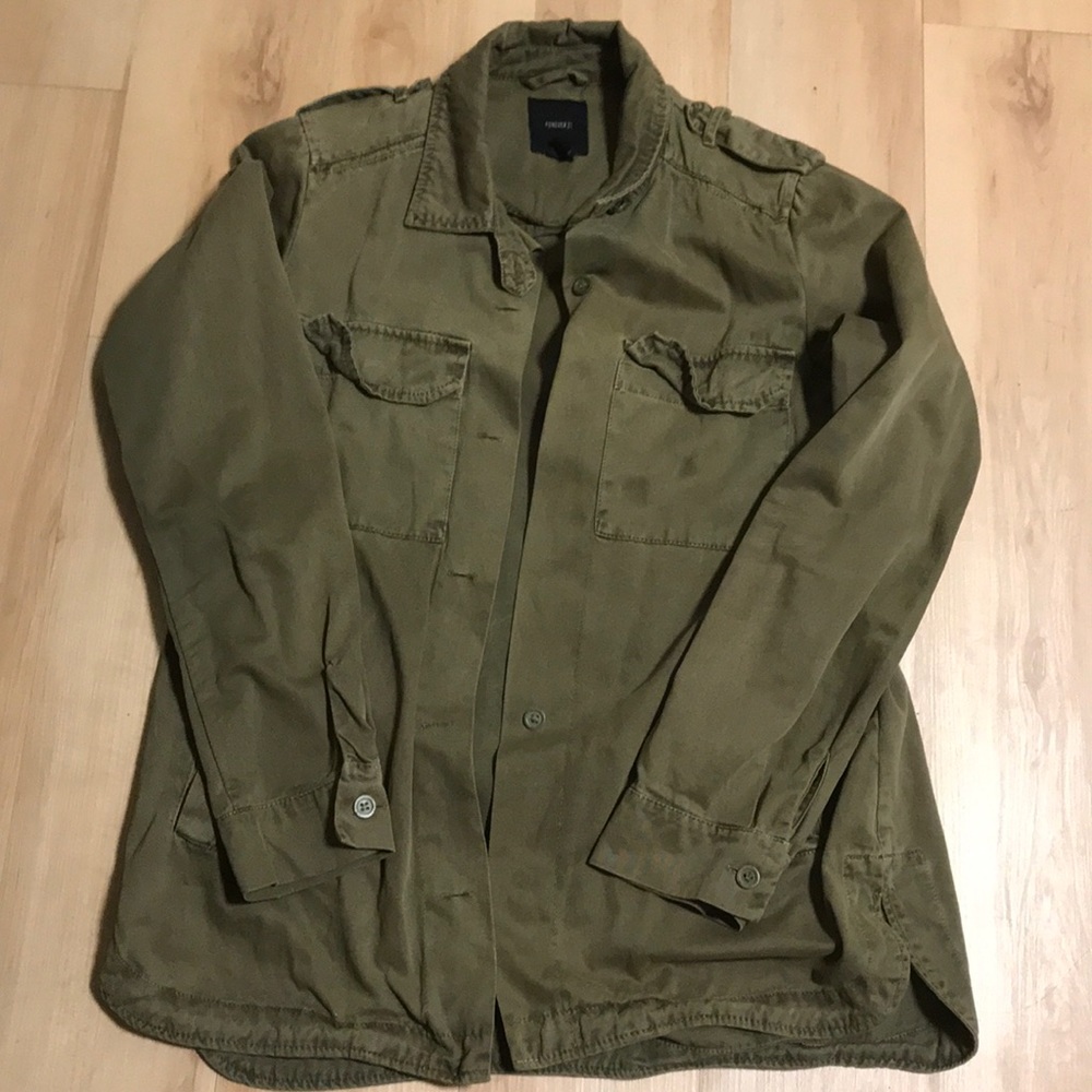 Green jacket with slight staining on left pocket